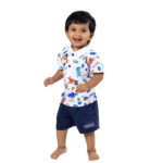 Cute Dino Printed Polo Top with Navy Shorts - Image 2